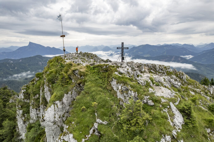 Wanderer am Gipfel des Schobers